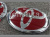 Toyota Land Cruiser Prado 150 (10-) оригинальные красные эмблемы на капот и заднюю крышку багажника, комплект 2 шт.